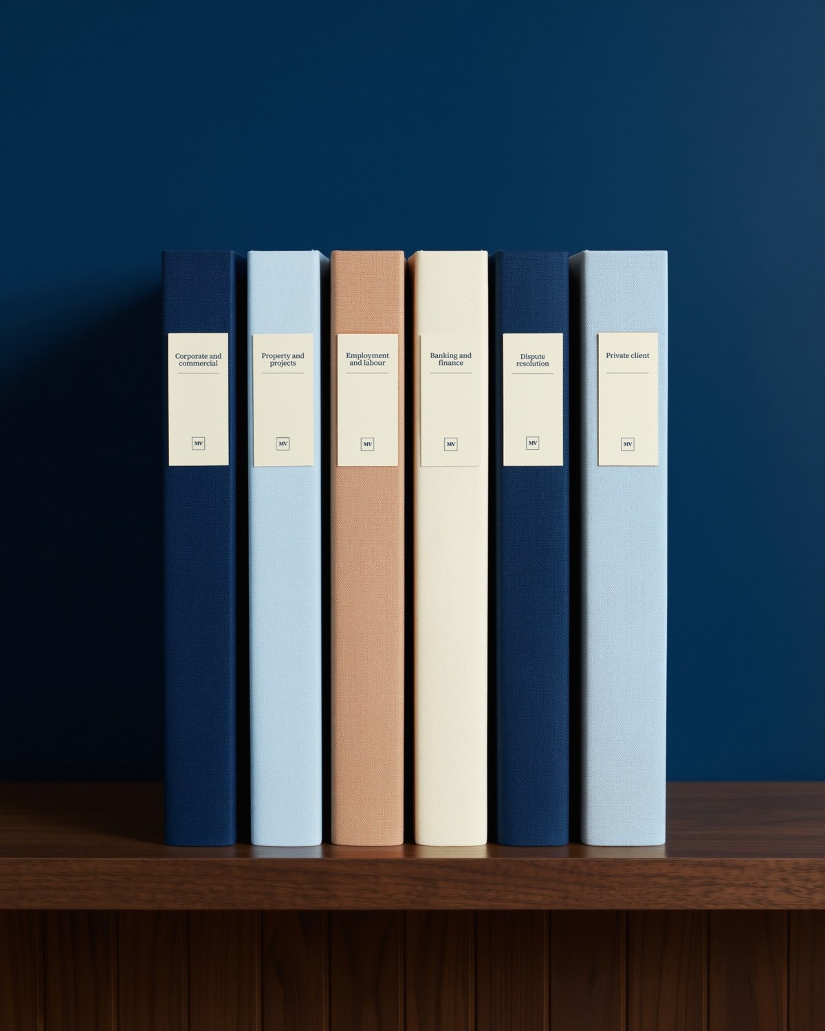 Binders on a shelf, a binder for each area of law