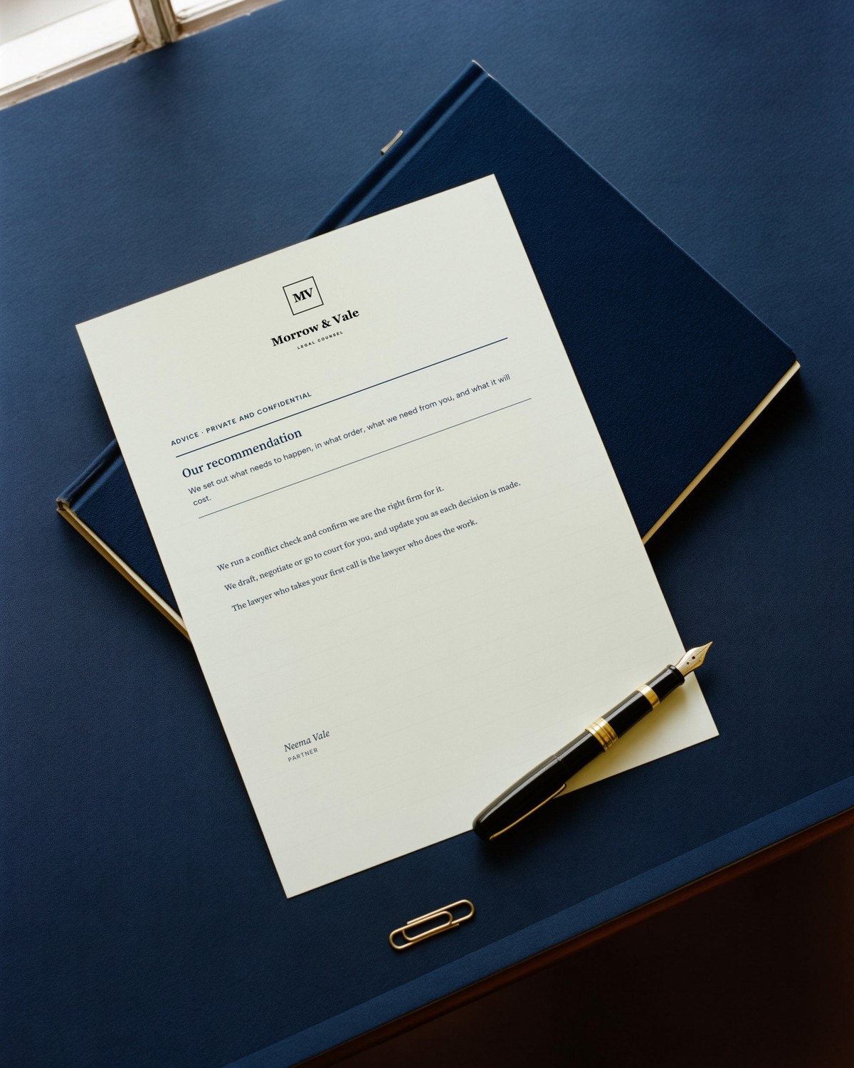 An advice letter headed Our recommendation, with a fountain pen